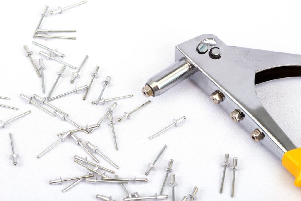 Rivet Stuck in Gun: Quick Fixes for Frustrated DIYers